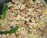 A picture of step 1 of Masala Walnut Pulao.