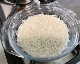 Une image de l'étape 3 de Salade de Riz aux Tomates, Thon, Feta et Romarin.