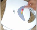A picture of step 16 of Schezwan mayo sendwitch.