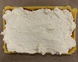 A picture of step 5 of Einkorn maple roll cake.