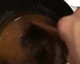 Gambar langkah 2 resipi Puding Caramel dalam bekas plastic.