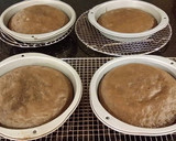 A picture of step 8 of Mocha Layer Cake with Whipped Mascarpone Cream and a Coffee Glaze Drizzle.