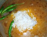A picture of step 11 of Potato And Tomato Pulao.