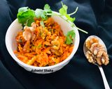 A picture of step 4 of Bombay walnut Carrot Salad with cashews.