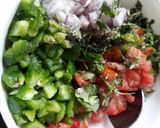 A picture of step 13 of Pita Bread Chick Pea Kidney bean filling with Tzatziki sauce.
