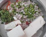 A picture of step 2 of Tandoori stuffed capsicum & Tomato.