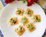 A picture of step 2 of Creamy cracker pizza 😋😋(Indian veg pizza creamy crackers).