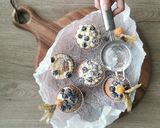 A picture of step 6 of Blueberries and vanilla frosted cup cakes.