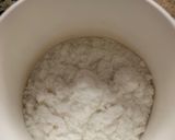 A picture of step 2 of Green Pudding with the hint of coconut powder and Pakola syrup.