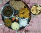 A picture of step 16 of Gujarati festive thali.
