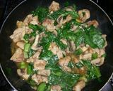 A picture of step 15 of Chicken and Mustard Green Stir-fry.