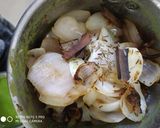A picture of step 2 of Egg pouch curry.