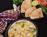A picture of step 6 of Nawabi Paneer Korma in white Gravy.