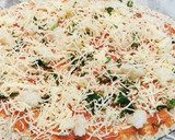 Foto del paso 2 de la receta: Pizza de Bacalao con Pimientos de Padrón y Aceitunas