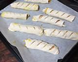 Foto del paso 2 de la receta: Flautas de salchichas al horno