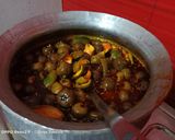 A picture of step 5 of Tangy glueberry Pickle.