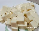 A picture of step 2 of [Rice Cooker Version] Salmon with Tofu.