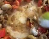 A picture of step 8 of Pork Medallions in a Mushroom and Sherry creamy sauce.