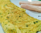 Foto del paso 6 de la receta: Rollito de tortilla con calabacín, pavo y queso