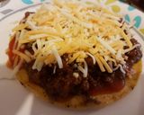 A picture of step 2 of Mexican pizza.