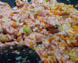 Foto del paso 4 de la receta: Tronquitos de calabacín rellenos de pollo y verduras