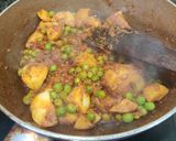 A picture of step 7 of Aloo Matar.