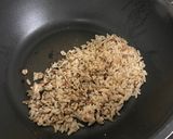 A picture of step 5 of Garlic fried rice with sliced grilled beef sirloin.