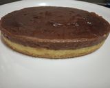 A picture of step 6 of Yakult Tripe layered choco custard biscuit cake.