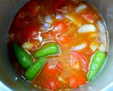 A picture of step 9 of Idly with sambar (without dal) for breakfast.