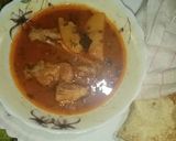 A picture of step 10 of Aloo gosht.