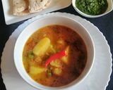 A picture of step 8 of Potato and peas curry.
