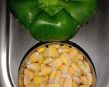 A picture of step 1 of Capsicum and Corn ki sabzi.