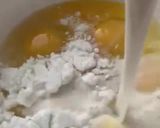 A picture of step 3 of Green Pudding with the hint of coconut powder and Pakola syrup.