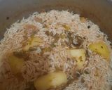 A picture of step 3 of Aloo Chawal.