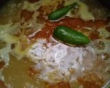 A picture of step 5 of Chicken Aloo Salan.