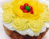A picture of step 7 of Ghewar with mango rabdi mousse.