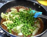 A picture of step 13 of Aloo Gobi Matar (Potato, Cauliflower, and Pea Curry).