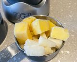 A picture of step 1 of Tropical Breakfast Smoothie 🥭🍍.