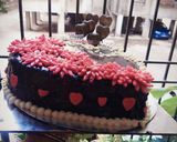 A picture of step 10 of Anniversary chocolate vanila cake.