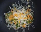 Foto del paso 3 de la receta: Arroz con vegetales y presas de pollo