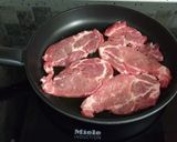Foto del paso 2 de la receta Chuletas gratinadas con queso y alcachofas fritas