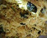 A picture of step 14 of Fafada-Kadhi with Grated Raw Papaya.
