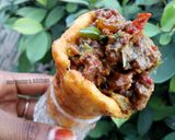 A picture of step 13 of Plantain stuffed cones.