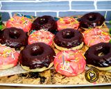 A picture of step 8 of No knead baked donuts with 2 different glaze.