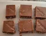 Foto del paso 3 de la receta: Cañas de hojaldre rellenas de turrón de chocolate y mermelada de naranja