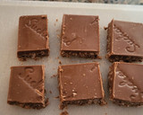 Foto del paso 3 de la receta: Cañas de hojaldre rellenas de turrón de chocolate y mermelada de naranja
