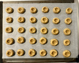 A picture of step 6 of Hazelnut Thumbprint Cookies.