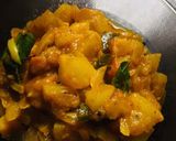 A picture of step 2 of Raw papaya sabji with rotis.