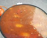 A picture of step 4 of Valencian Paella with Rabbit and Chicken.