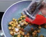 A picture of step 4 of Catalan chickpeas and spinach.